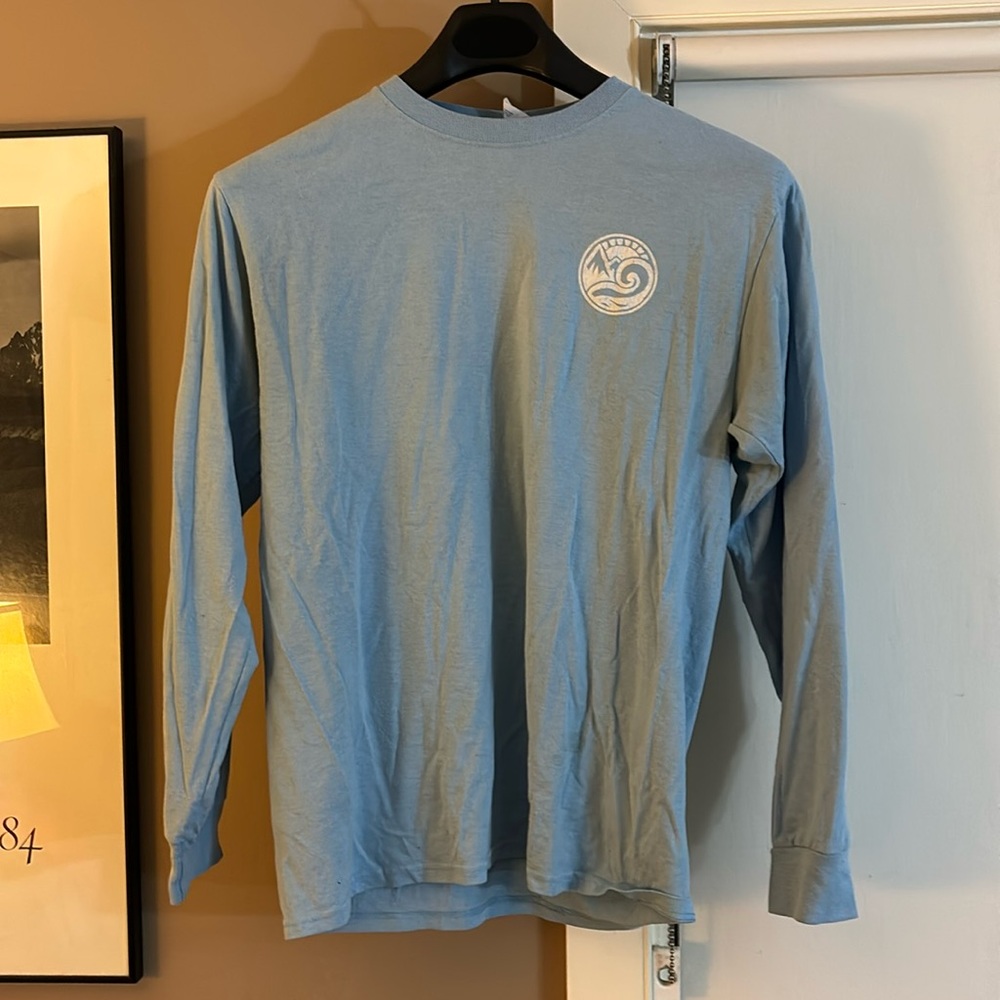 Women’s long sleeve t shirt.  Happy earth medium.